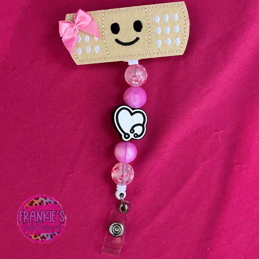 Girl Pink Bandaid Beaded Badge Reel